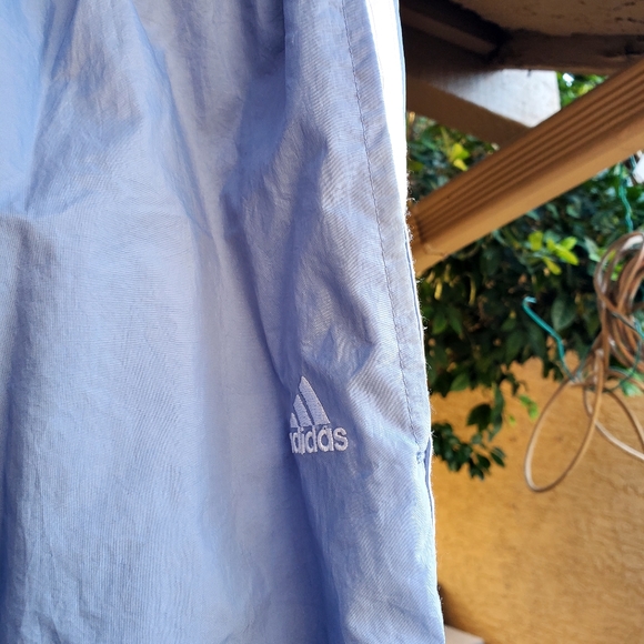 Adidas Womens warmup pants. The pants are nylon/poly, size medium. - Picture 1 of 3